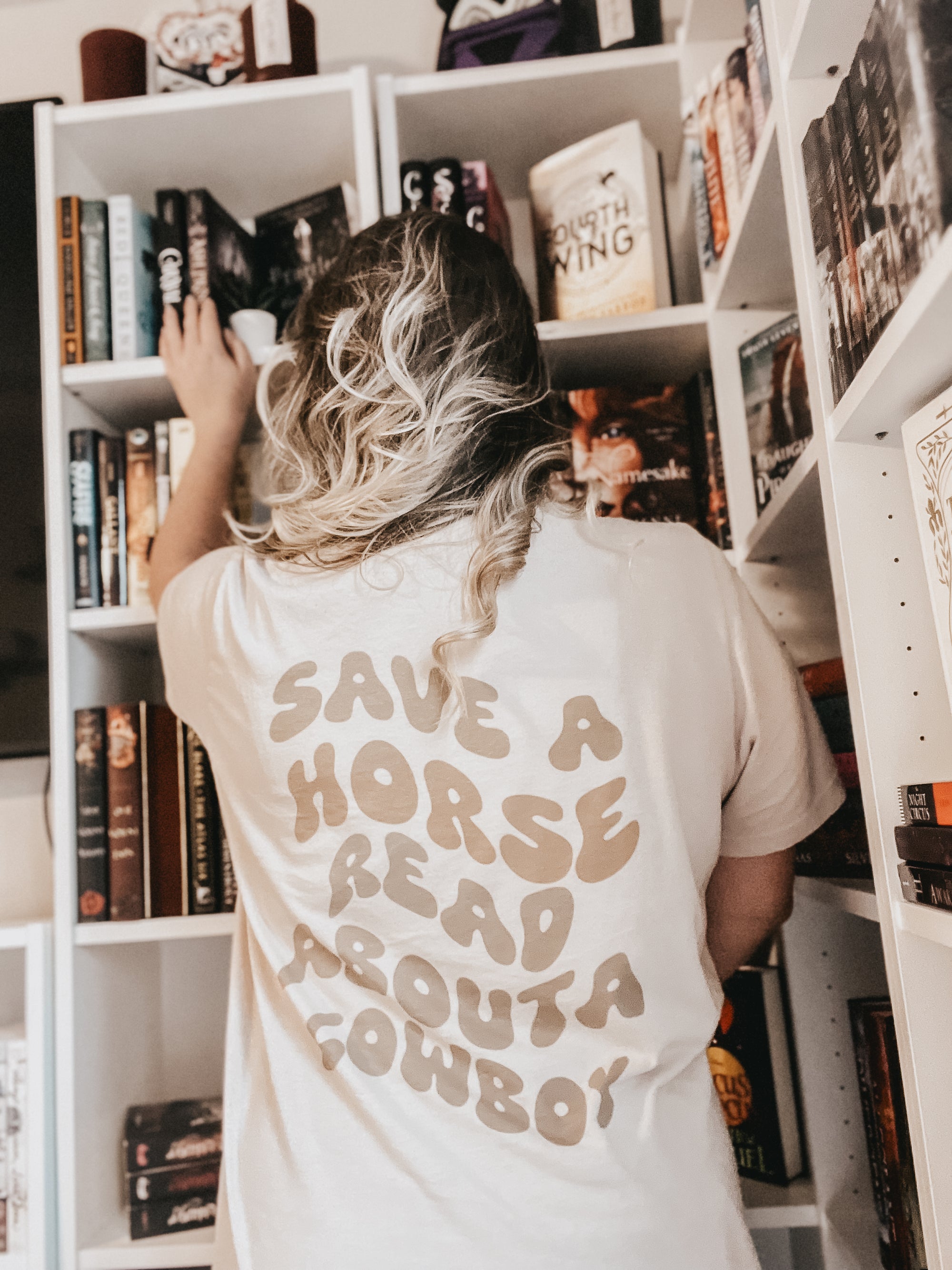 read about a cowboy tee